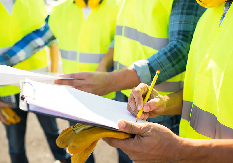 Builders cleaning site